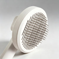 Pet grooming brush